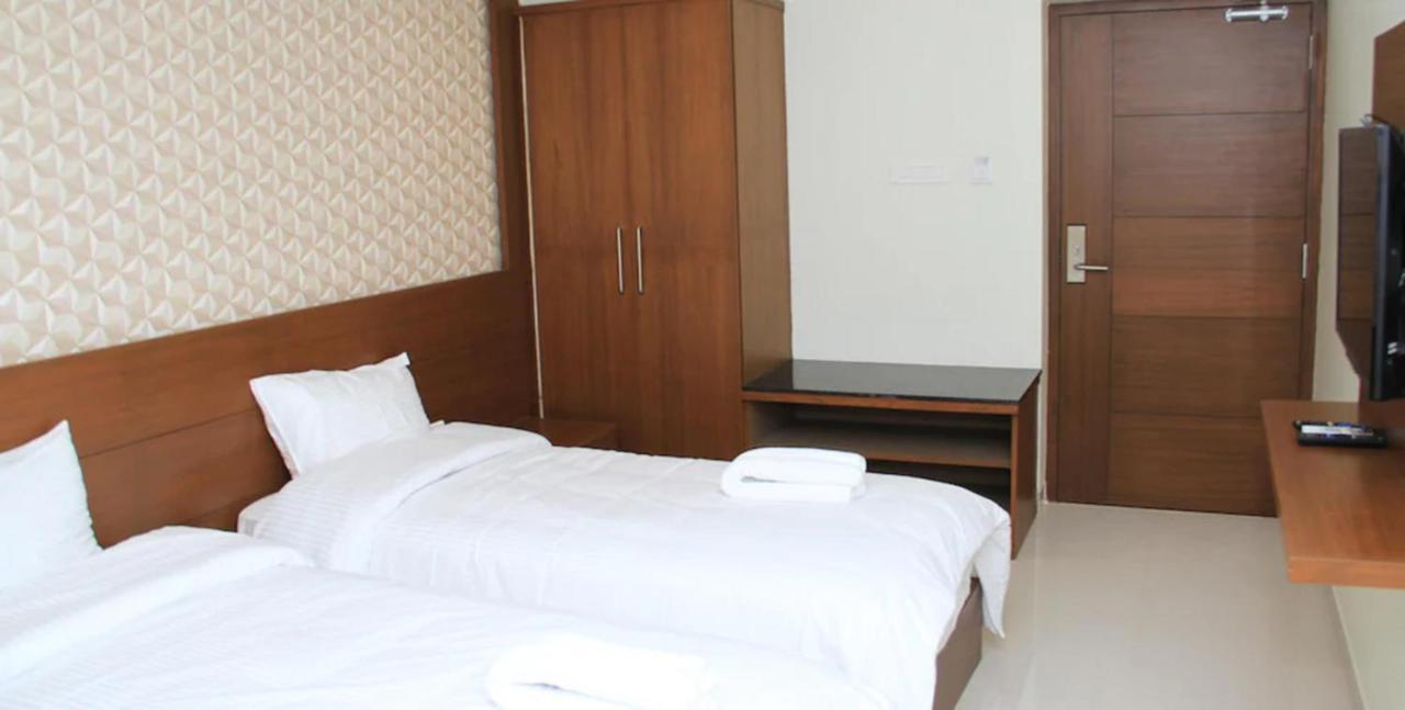 A And M Rooms And Residences شيناي المظهر الخارجي الصورة